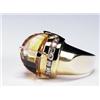 Image 1 : 14K YELLOW GOLD RING, set with an unusual saddle-shaped fancy cut citrine flanked by 14 channel s...