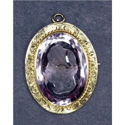 OVAL CARVED PALE AMETHYST CAMEO, depicting the profile of a classic maiden, in a 14k yellow gold...