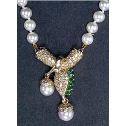 SINGLE STRAND PEARL NECKLACE, composed of 87 cultured pearls (6.0mm to 6.5mm) and completed with...