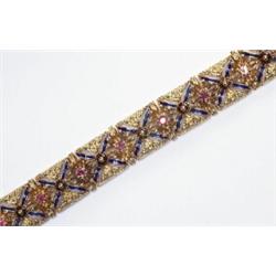 18K YELLOW GOLD FILIGREE BRACELET, formed of square links separated by 12 full cut rubies (approx...