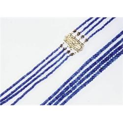 4-STRAND GRADUATED SAPPHIRE BEAD NECKLACE, completed with a 14k yellow gold filigree clasp, l. 24...