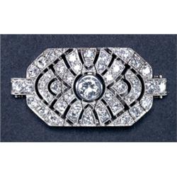 PLATINUM FILIGREE BRACELET SEGMENT, bezel set with a European cut diamond (approx. 0.80ct.) surro...