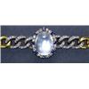 Image 1 : FRENCH 18K YELLOW GOLD AND SILVER BRACELET, formed of a central medallion set with a large moonst...