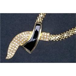 14K YELLOW GOLD NECKLACE, formed as a mesh chain with a cross-over pendant set with 57 brilliant...