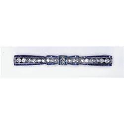 PLATINUM AND 18K YELLOW GOLD FILIGREE BAR PIN, bezel set with 24 various old cut diamonds (approx...