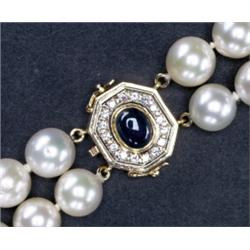 DOUBLE STRAND PEARL NECKLACE, composed of 90 cultured pearls (9.0mm x 9.5mm) and completed with a...