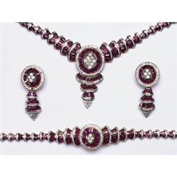 4 PIECE 18K YELLOW GOLD, RUBY AND DIAMOND JEWELLERY SUITE, comprised of a bracelet, a necklace an...