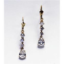 PAIR OF 14K YELLOW GOLD HOOK BACK DROP EARRINGS, each set with a pear cut diamond (approx. 0.95ct...