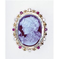 OVAL CARVED SHELL CAMEO, depicting the profile of a maiden, in a 14k yellow gold brooch/pendant m...