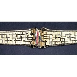 ITALIAN 18K YELLOW GOLD BRACELET, with an overlain white gold central motif set with 7 full cut r...