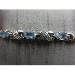 Blue topaz 6. carat tennis bracelet