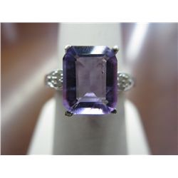 Emerald cut amethyst ring set with 6 diamonds