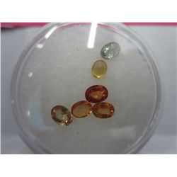 Gem jar filled with multi coloured sapphires