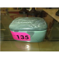 Carved stone music box
