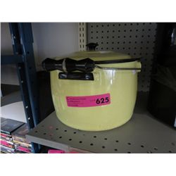 Vintage yellow enamel pot with lid and handle