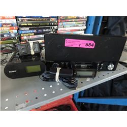 2 Electronic alarm clocks with iPod docks