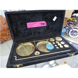 Brass balance beam scale with weights
