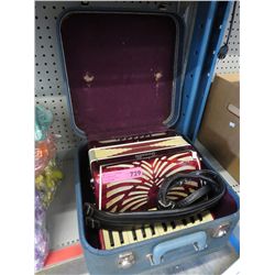 Vintage Carnelli accordion - red fleck, in case