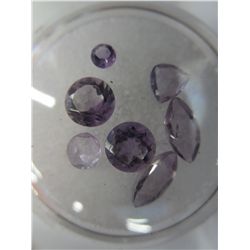 Gem jar filled with assorted amethyst gemstones