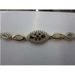 Blue sapphire & diamond tennis bracelet. 12 grams