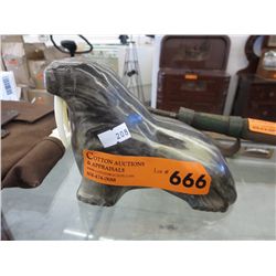 Signed carved walrus statue
