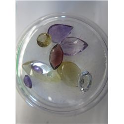 Gem jar filled with misc. cut gemstones