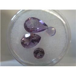 Gem jar filled with rich purple assorted amethysts