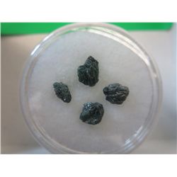 Gem jar filled with 4 blue diamonds in the rough