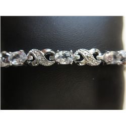 Ladies diamond & white topaz tennis bracelet