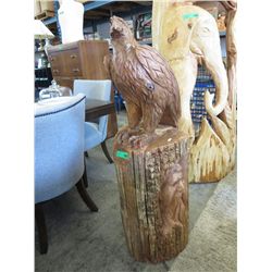 Earl Martin chainsaw carving of an "Eagle and Man".