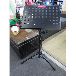 Sheet music stand with adjustable base