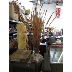 Large resin floor vase with grass arrangement