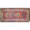 Image 1 : A BERGAMA LONG RUG, western Turkey, c. 1920, the rust/red field containing four eight point star...