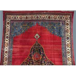 A FINE BIDJAR CARPET, west Persian, c.1920, with a bold deep blue pendant medallion with four int...