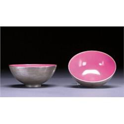 A FINE PAIR OF PINK AND SILVER GLAZED WINE CUPS, the interiors with a slightly orange peel textur...
