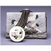 Image 1 : A FINE KINCHAKU, the case embroidered with cranes and Mt. Fuji, the silver clasp showing Mt. Fuji...