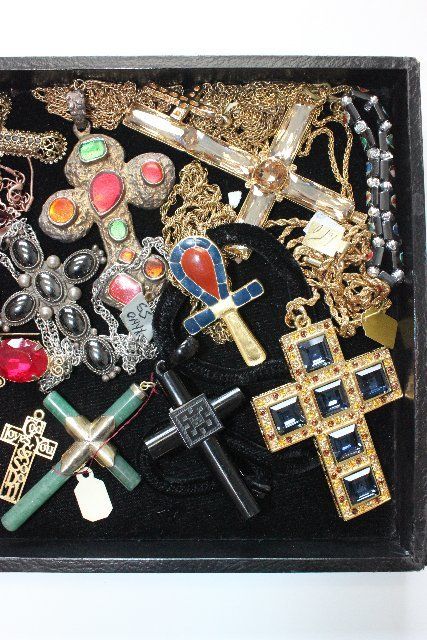 Assorted costume jewelry crosses