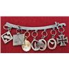 Image 2 : 7 MINIATURE NAZI GERMAN CHARMS ON SWORD PIN