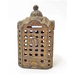 VINTAGE 3-3/4" TALL CAST IRON BUILDING COIN BANK