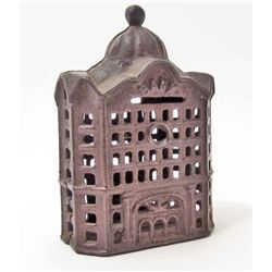 VINTAGE 4-3/4" TALL CAST IRON BUILDING COIN BANK