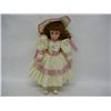 Image 1 : Seymour Mann Porcelain Doll in Cream, Green, and Pink Dress