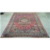Image 1 : Antique Persian Kirman Laver carpet with a pattern of meandering flowers on...