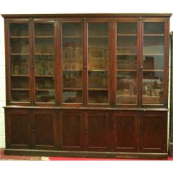 Victorian stained pine library bookcase with moulded cornice above 6 glazed...