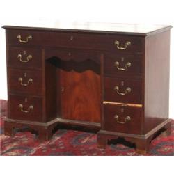 C18th George III mahogany kneehole desk with long drawer above secret drawer...