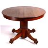 Image 1 : Solid Round Oak Table This lot features a solid ro
