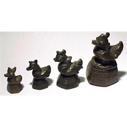 BURMA, c. 1800 -1850. A set of four smaller hentha weights similar to above lot. H: 2-4 cm.    $...