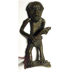 WEST AFRICA, GOLD COAST (GHANA), Ashanti Tribe, c. 1875-1900, a fine weight with a man wearing a...