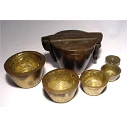 Germany, c. 1840 a complete set of "Nuremberg" type nested weights with four cups and central pl...