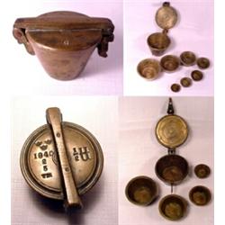 Germany, c. 1840, a lot of two brass nested "Nuremberg" type nested weights, both missing their...