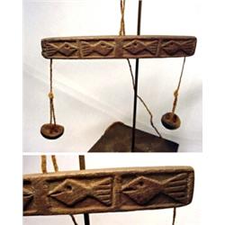 Peru, Northern Coast, Chancay Culture, c. 1000-1400 AD. a rectangular wood beam carved in bas rel...